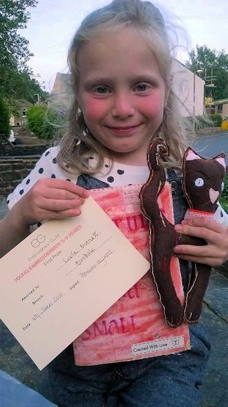 Leela Burnett and her certificate
